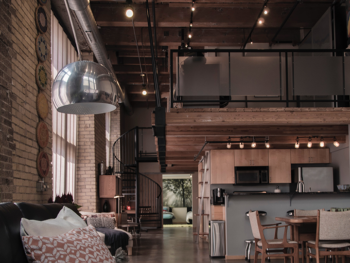 A loft space with a lot of wood detailing